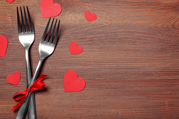 Fork and knife with hearts  - Фото, зображення
