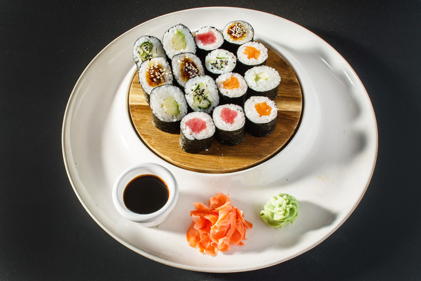 tasty sushi on plate - Фото, изображение
