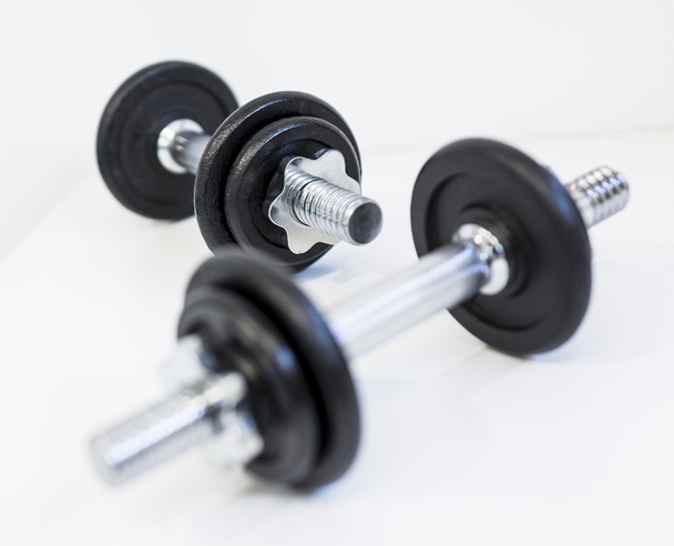 Dumbbells on a white background. - Foto, immagini
