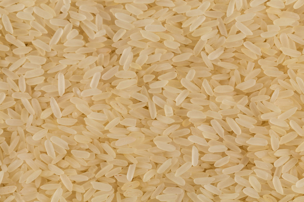 Uncooked rice background - Foto, afbeelding