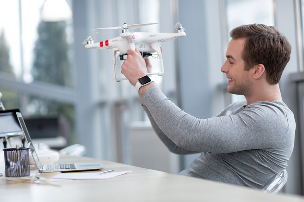 Skillful male freelancer is designing a drone - Fotografie, Obrázek