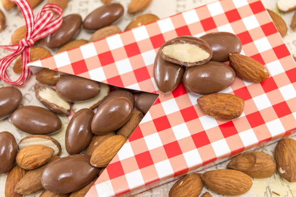 Fresh and chocolate covered almonds - Photo, Image