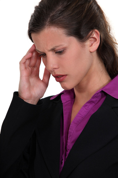 Businesswoman with headache - Foto, afbeelding