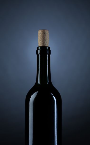 Close up Wine bottle on dark studio background photo - Foto, Bild