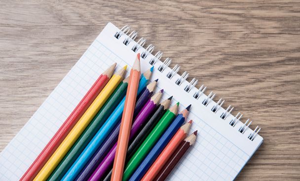 colored pencils closeup on dark background - Фото, изображение