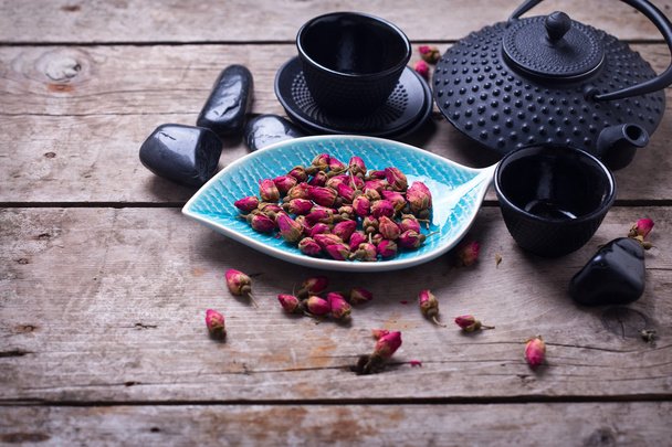 Dry rose tea in bowl - Fotó, kép