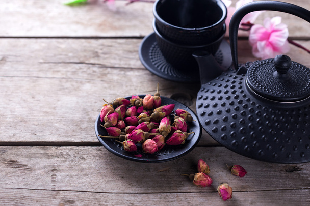 Dry rose tea in bowl - Fotó, kép