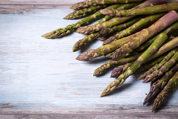 Fresh asparagus on wooden table , diet concept - Fotoğraf, Görsel