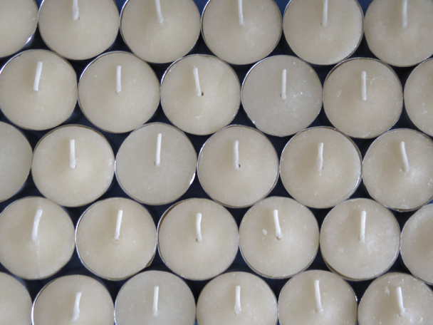 Rows of white wax tea light candles - Photo, Image