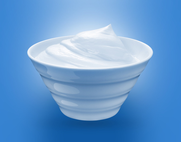 Valkoinen kerma tai jogurtti kulhossa
 - Valokuva, kuva