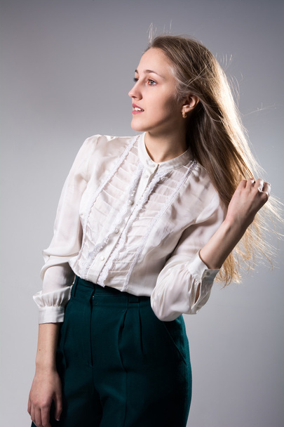 Beauty portrait of a young blonde girl - Фото, изображение