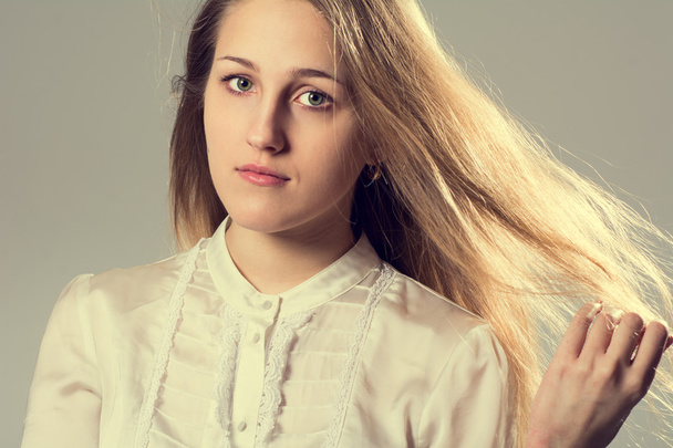 Beauty portrait of a young blonde girl - Fotografie, Obrázek
