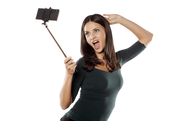 selfie com monopoda
 - Foto, Imagem