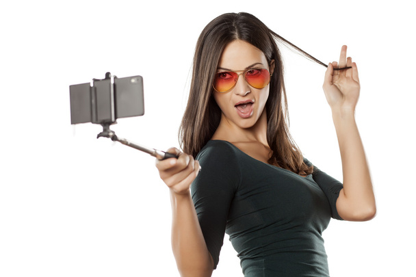 selfie monopodin kanssa
 - Valokuva, kuva
