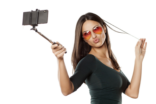 selfie com monopoda
 - Foto, Imagem