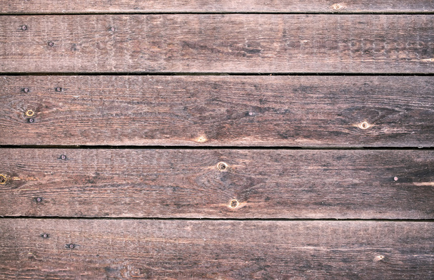 Fragment of red vintage wooden fence texture - Foto, imagen