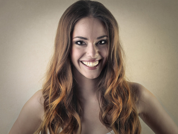 Portrait of woman smiling - Foto, imagen