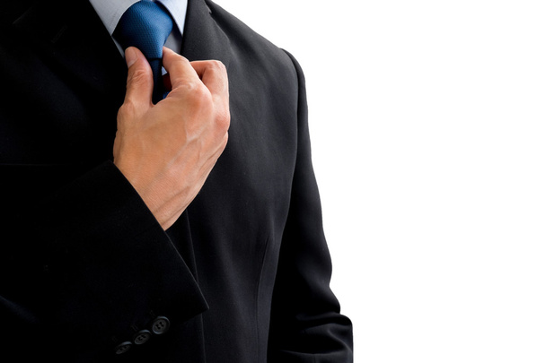 Üzletember átrendezése a nyakkendőjét - Fotó, kép