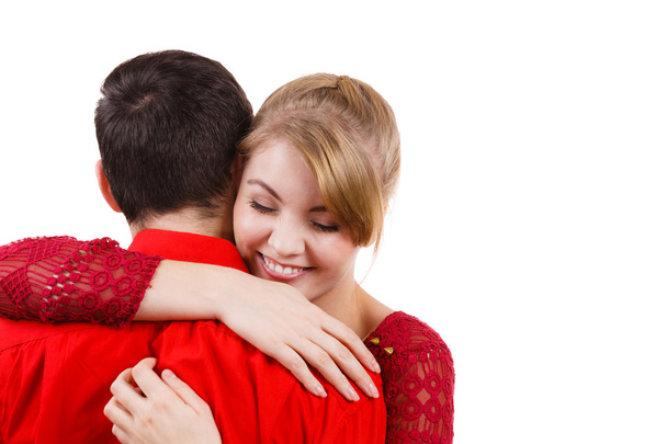 Girl hugging boyfriend romantically. - 写真・画像