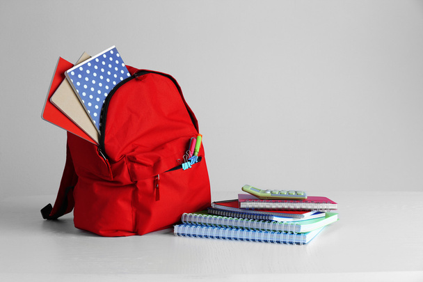 Backpack with school supplies  - Фото, изображение