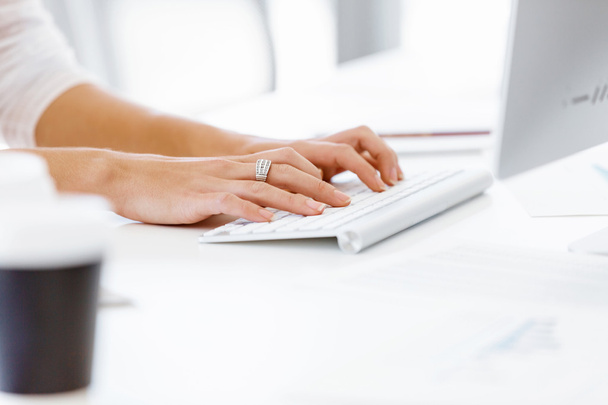 Female hands typing on the keyboard - Foto, imagen