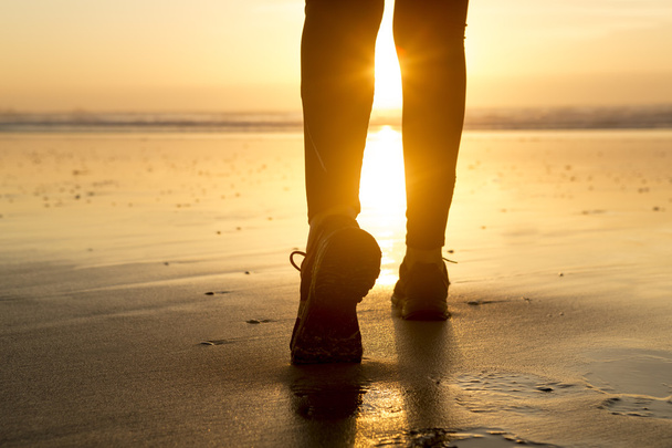 Female legs Walking to the sunset - Fotoğraf, Görsel