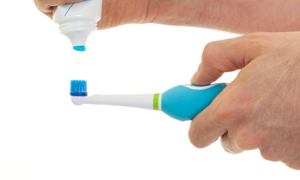 Cepillo de dientes eléctrico aislado
 - Foto, imagen