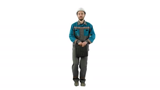 Funky and successful engineer, manager or architect dancing and having fun on white background. - Video