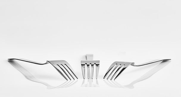 Three forks and reflection - Фото, изображение