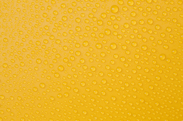 Water-drops on yellow - Φωτογραφία, εικόνα
