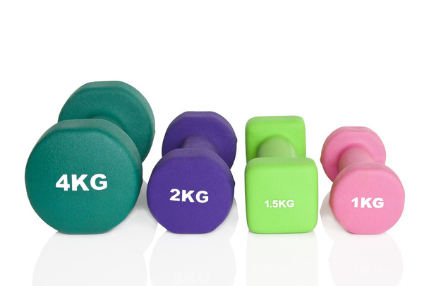 Pink, green and purple dumbbells - Photo, Image