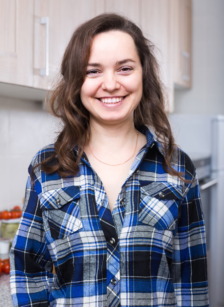 Portrait of brunette girl in kitchen - Фото, зображення
