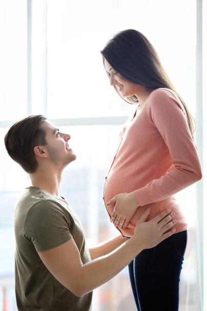 pregnant woman with husband - Фото, изображение
