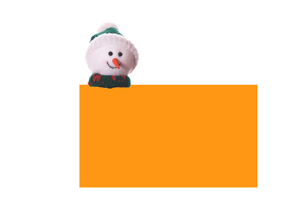 Tarjeta naranja de Navidad con muñeco de nieve
 - Foto, Imagen