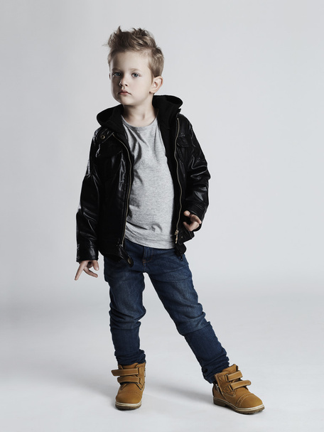 Fashionable child in leather coat.little boy hairstyle.funny kid - Φωτογραφία, εικόνα
