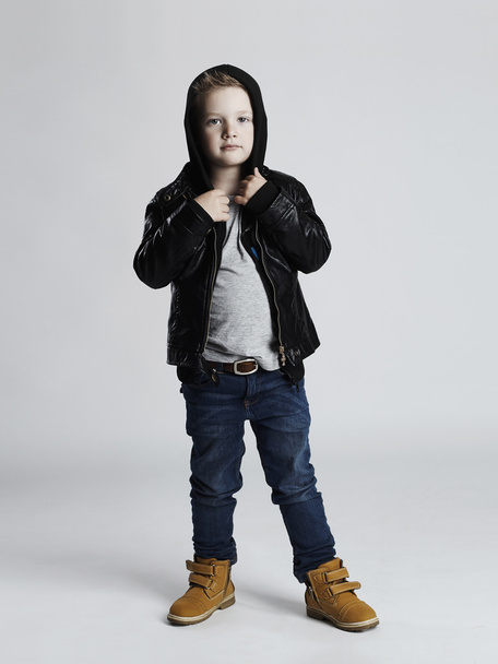 Funny child.fashionable little boy.stylish kid in yellow shoes - 写真・画像