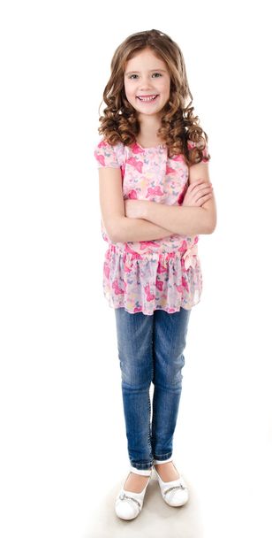 Portrait of adorable happy little girl in jeans - Foto, Imagen