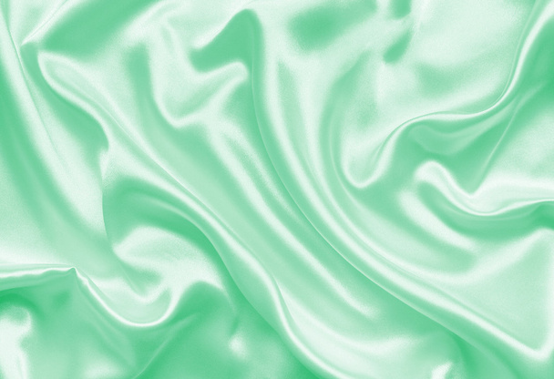 Smooth elegant green silk or satin texture as background - Photo, Image