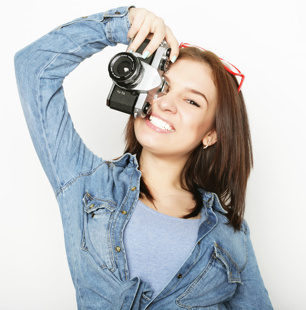 young pretty woman holding camera - Foto, Imagem