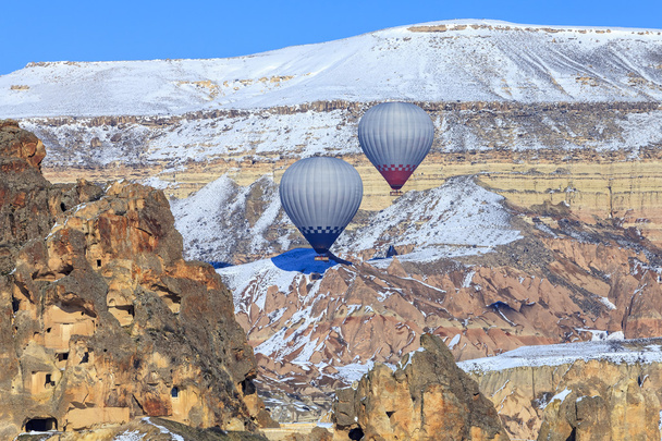 Two balloons on a background of mountains of Capadocia. Turkey. - Fotografie, Obrázek