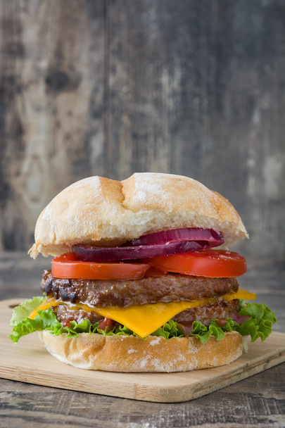 Homemade burger on rustic wood - Photo, Image