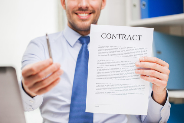 close up of businessman holding contract document - Fotoğraf, Görsel