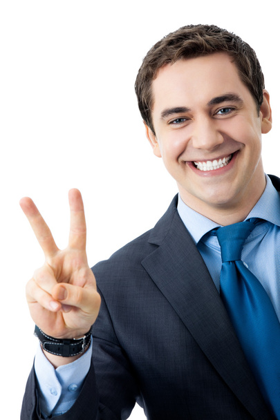 Businessman showing two fingers or victory sign - Foto, imagen