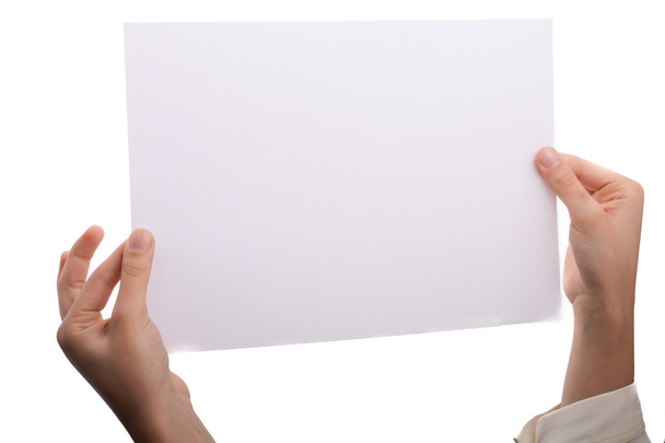 arkusz papieru w ręku  - Zdjęcie, obraz