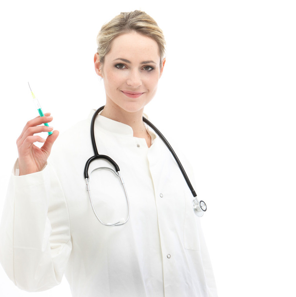 Female doctor holding syringe - Fotoğraf, Görsel