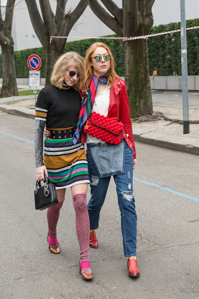 Two fashionable girls outside Emporio Armani fashion show during - Photo, Image