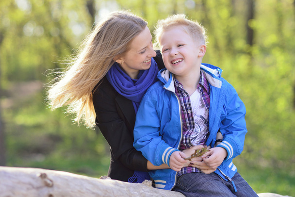 young mother with her son five years, laughter, outdoor, fun - Foto, Bild