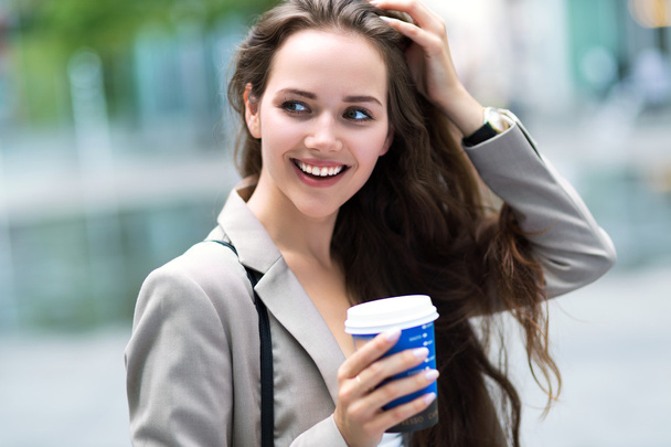 Woman with coffee to go - Foto, Bild