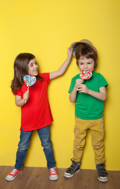 Children enjoying lollipop - Valokuva, kuva