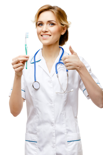 Woman doctor standing on white background - Foto, Imagem